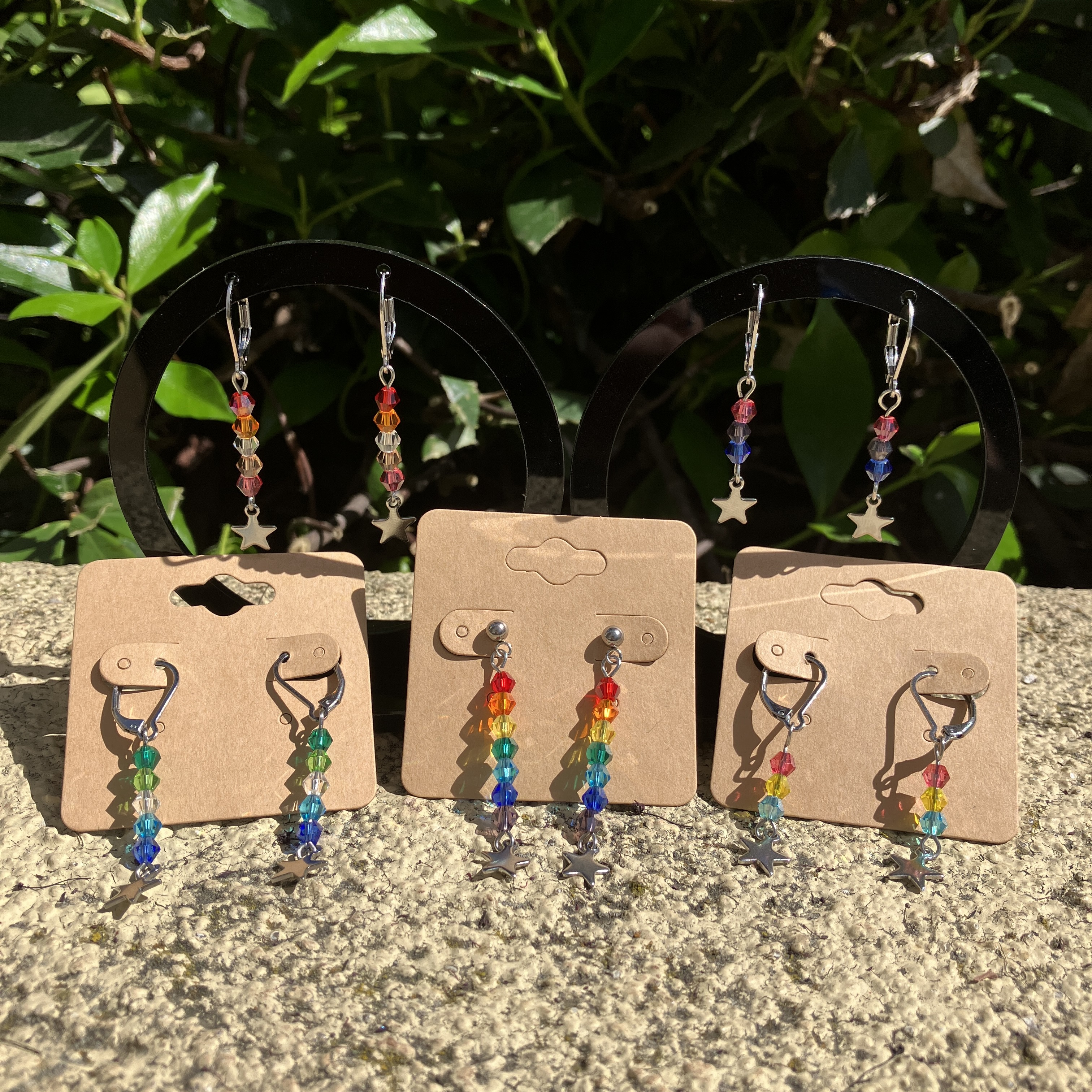 LGBTQ+ Pride earrings.
